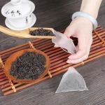 Tea Bag Nylon Empty Nylon Pyramid Tea Bag Filter Mesh Bags With Your Own Logo Printed
