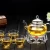 Import 600ml Heat Resistant high borosilicate glass tea set water pot pitcher with filter from China