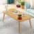 Import Amazon new design small size portable solid wood foldable laptop table from China