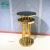 Import Black glass top round hollow middle design golden color high top cocktail tables from China