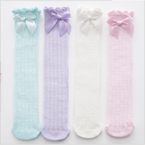 Candy color warm fashion baby knee high stocking with bow