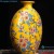 Import Ceramic Hand Painted Yellow Flower Color Ceramic Flat Belly Bottle Porcelain Vase from China