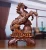 Import Chinese Traditional Fengshui Poly Resin Home Decoration Sculpture Wood Texture  Fortune Horse Sculpture from China