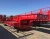 Import Customized 3Axles low bed flatbed semi trailer mounted crane transport flatbed gooseneck trailer from China