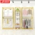 Import Fashion Brass Metal Gold Hanging Clothing Dress Display Racks display furniture/ Cloth Store display stand from China