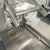 Import Flow Automatic Food Tray Packing Sealing Machine from China