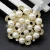 Import High quality china wholesale handmade pearl bulk korean brooch from China