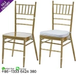 Modern cheap furniture dining table set gold stackable metal restaurant chairs for event