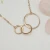 Import New custom stainless steel gold plated triple ring women jewelry pendant necklace from China