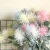 Import Plastic Sea Urchin Flocking Artificial Faux Flower Gypsophila for Wedding Party Home Garden Decoration from China