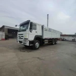 Sinotruk 400/430HP 6*4 Sidewall Drop Flatbed Lorry 10 Wheeler Board Fence Box Cargo Truck with Full Trailer for Ethiopia Sale