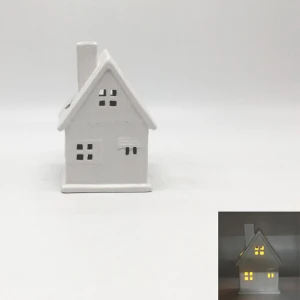 Supply Christmas ceramic house plating Christmas hollow candlestick with LED lights Christmas ornaments