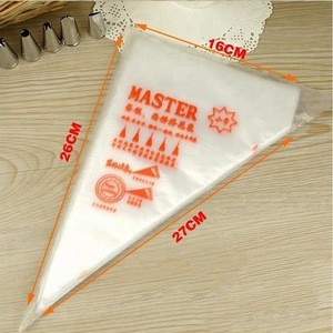 Wholesale cake make tools 100pcs/pack plastic bags disposable frosting pastry cake cream squeeze bag tool