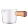 Wooden cooking cup with high borosilicate handle