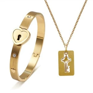 Factory produce customised wholesale fashion stainless steel love locks key couple jewelry set