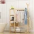 Import Free-Standing Closet  Multi-function Large Garment Rack with Storage Hanging Rods Pine Wood Heavy Duty Clothes Organizer from China