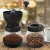 Import Manual Coffee Grinder with Ceramic Burrs, Hand Coffee Mill with Two Glass Jars from USA