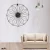 Import Modern Creative battery operated mechanical clock iron round hollow out geometric metal wall clock from China