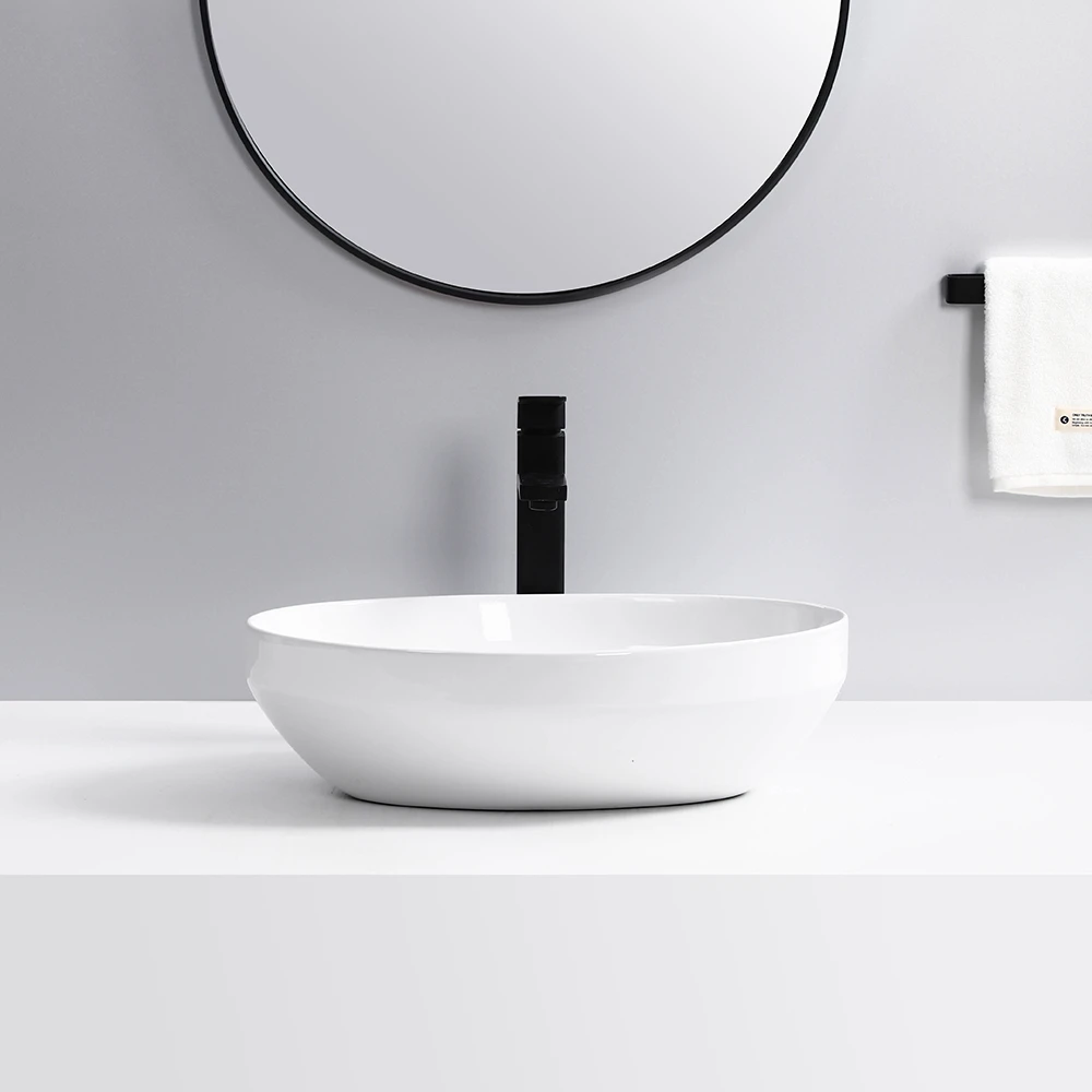Modern simple design oval hand sink luxury bathroom white ceramic countertop wash basin