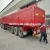 Import The factory direct selling 80T heavy rollover dump semi trailer, specializing in coal and ore from China