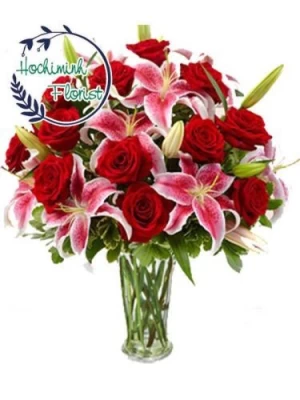 2 Dozen Pink Lilies And Roses In The Vase