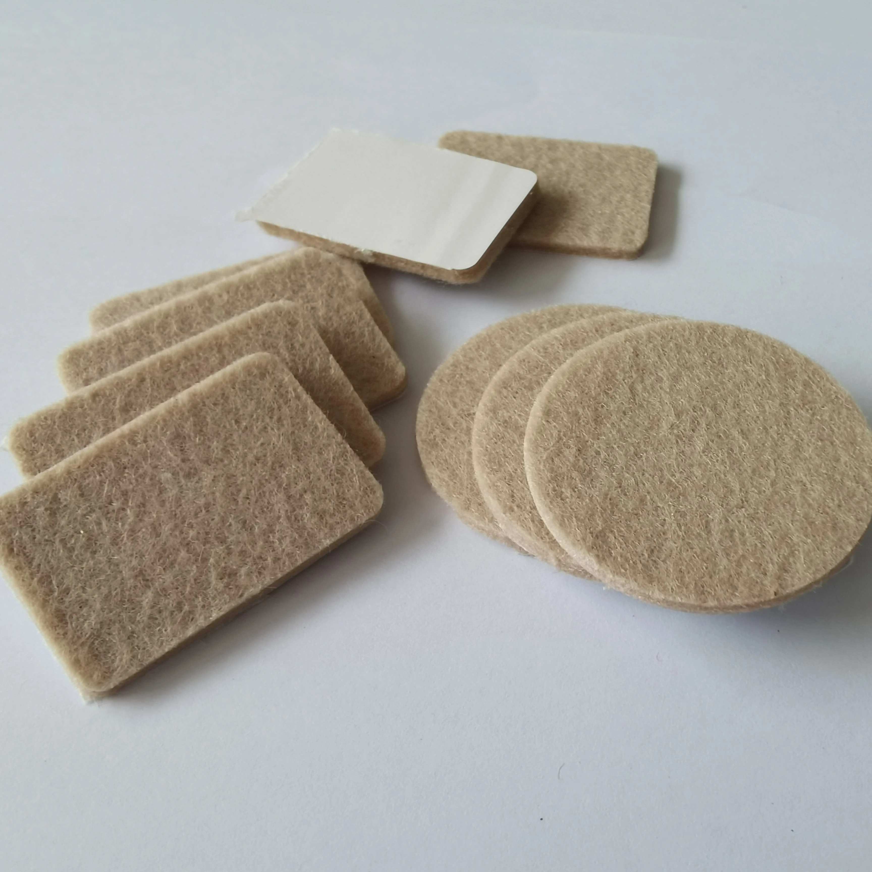 4mm 800g/sqm fiber material Furniture accessories sand Customized self adhesive felt furniture pads