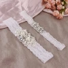 Beautiful lace wedding garter made by pearls and rhinestones