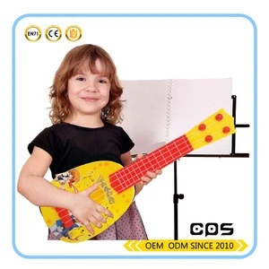 Children learning guitar musical instrument toys
