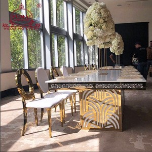 Gold stainless steel  wedding hot design dining table set with 8 chairs
