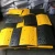 Import high quality 50cm long yellow and black rubber speed hump from China