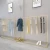 Import Kainice Retail Garment Store Interior Design Black Kids Clothing Rail Wall Mounted Men Clothes Display Racks from China