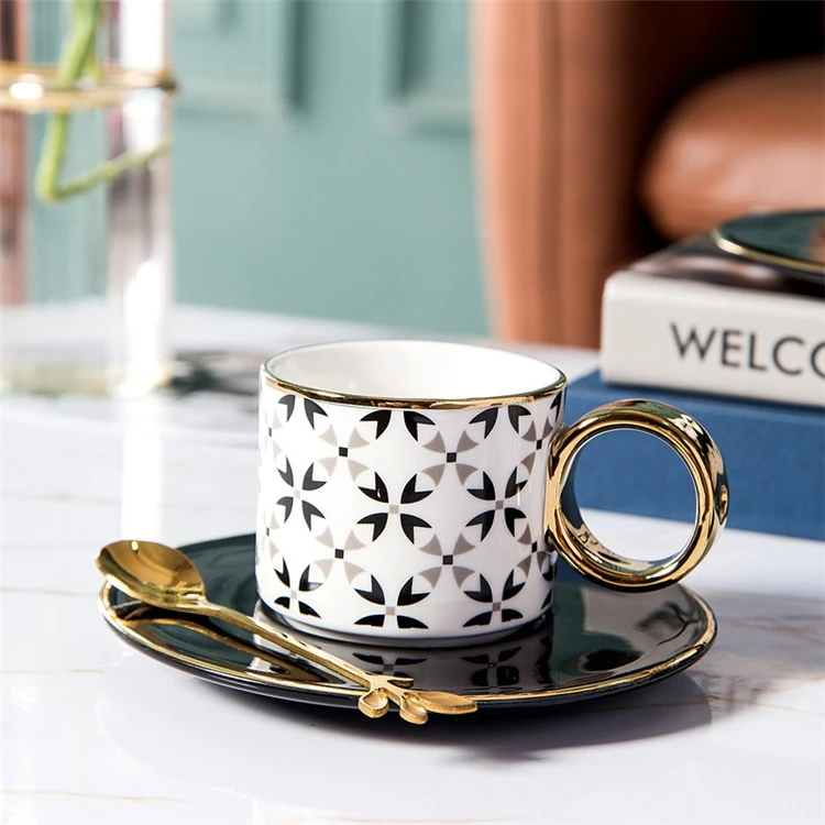 https://img2.tradewheel.com/uploads/images/products/6/3/modern-home-goods-custom-decal-luxury-coffee-tea-cup-set-ceramic-cup-and-saucer-with-gold-handle1-0338655001632572482.jpg.webp