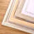 Import modern simple design gold colored plastic picture frame fashion poster frame wholesale from China