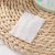 Import Niaowu Wholesale 600pcs Disposable Facial Clean Tools Pearl Grain Face Cleaning Cotton Pad N807 from China