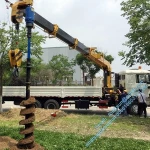 SINOTRUK HOWO 8x4 12 wheeler MOUNTED CRANE TRUCK with Auger Torque Earth drill for drilling telegraph poles