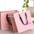 Import Wholesale custom pink gift shopping packaging paper bag with ribbon handle from China