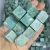 Import Wholesale natural semi precious gemstones Amazonite quartz cube tumbled stones from China