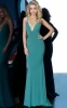 Form fitting prom dress floor length with train sleeveless bodice with plunging neckline spaghetti straps over shoulders low ruched back with criss cross spaghetti straps.