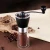 Import black color portable mini coffee grinder conical ceramic burr coffee travelling grinder mills from China