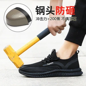 black colored anti smash anti stab fly rubber sole knit industrial shoes for men and woman