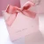 Import custom design pink premium gift paper bag with silk ribbon from China