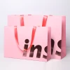 Custom logo printing  Cheap art paper Recycled branded smart retail paper shopping paper bags with ribbon handles