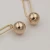 Import Duoying OEM aretes vintage long paper clip ball earrings fashion alloy women earrings geometric gold plated earrings from China