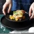 Import European Style Luxury Restaurant Matte Black Round Ceramic Dinner Plates from China