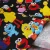 Import factory cheap price t shirt fabrics rainbow color Sesame Street cartoon cotton textile material bag fabric with custom logo from China