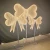 Import Factory sales 2024 new style wedding decoration lights LED bow lights butterfly wings warm white light from China