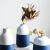 Import Fresh design cheap wholesale custom logo home goods ikebana ceramic vases / wedding decor porcelain bud vase from China