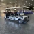 Import Hot Selling 5KW Farm Utility Off Road Electric 6 Seater Golf Cart with Folding Windshield amusement park use from China