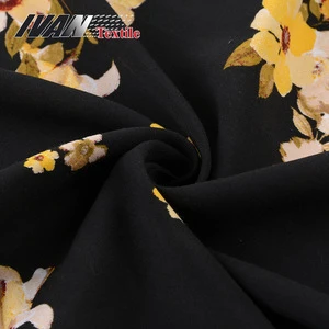 Hot selling stock lots black fashion Printed 100% rayon woven fabric for dress