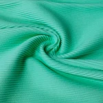 Knitted 85 nylon 15 spandex ribbed textured swimwear fabric